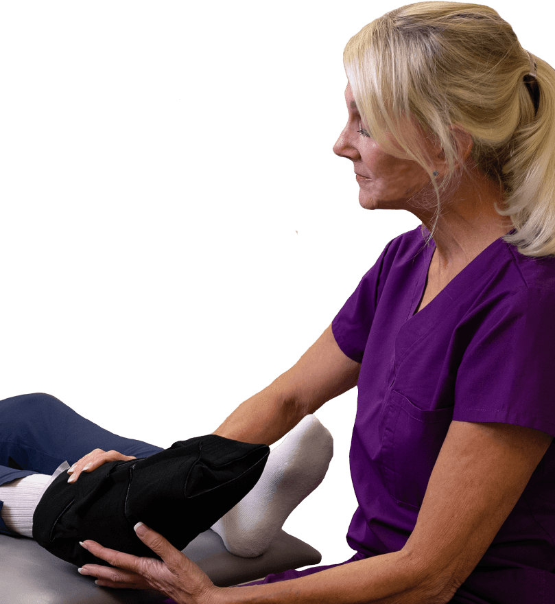Chemo Infusion Cooling Wraps Nurse applying an SMI Chemo Wrap to a patient's foot