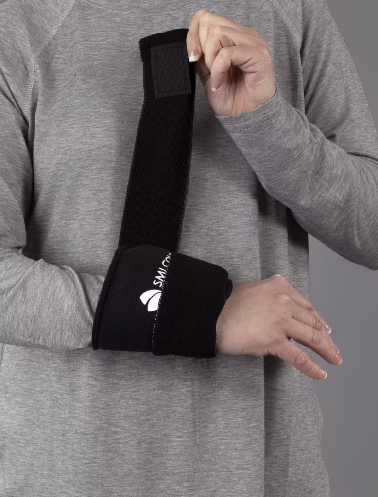 An SMI Cold Therapy Hand/Wrist/Elbow Wrap on the Wrist
