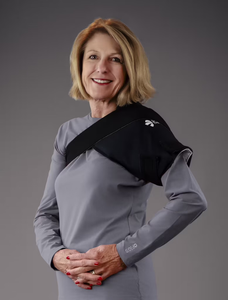 Woman wearing an SMI Cold Therapy Compression Shoulder Wrap
