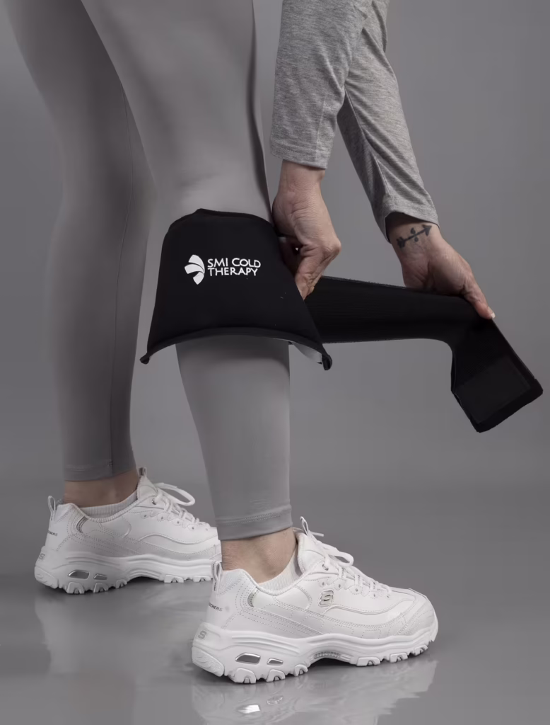 An SMI Cold Therapy Universal Wrap on the Calf
