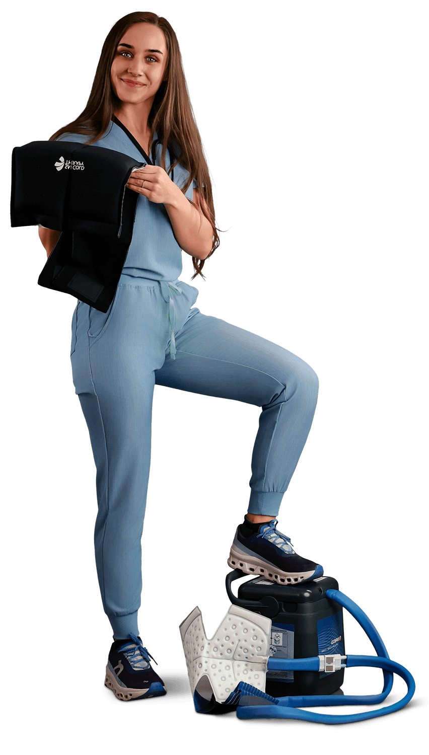 Nurse with an SMI Cold Therapy Wrap stepping on the competitor's cooling machine