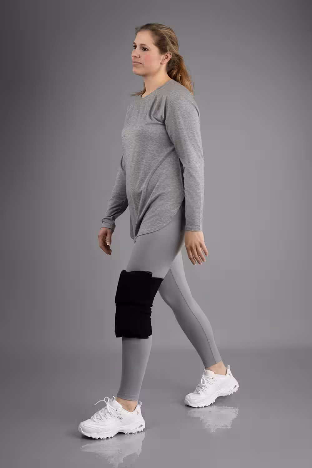 Woman Walking Wearing an SMI Knee Wrap
